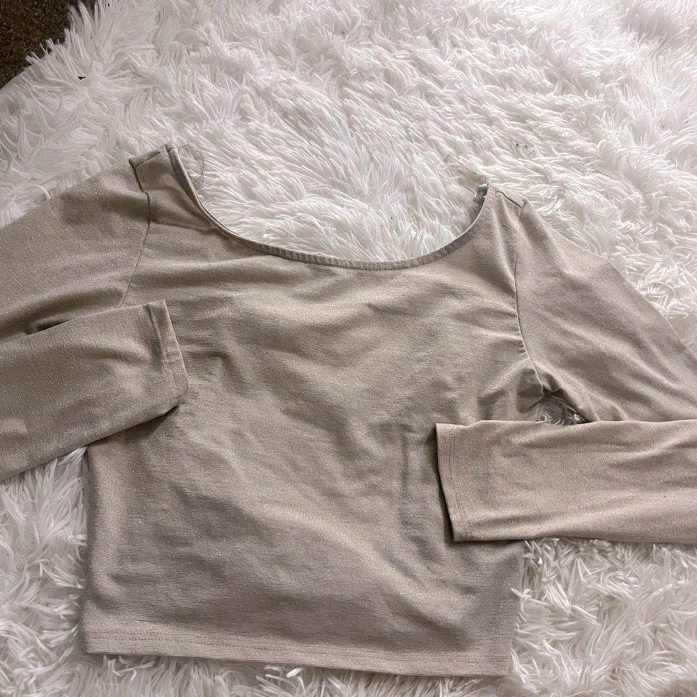 Gifted but Never worn, too small